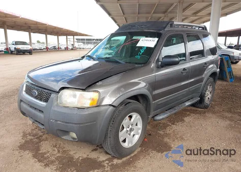 2004 Ford Escape Xlt z USA, uszkodzony, nr VIN 1FMYU93104KB26669